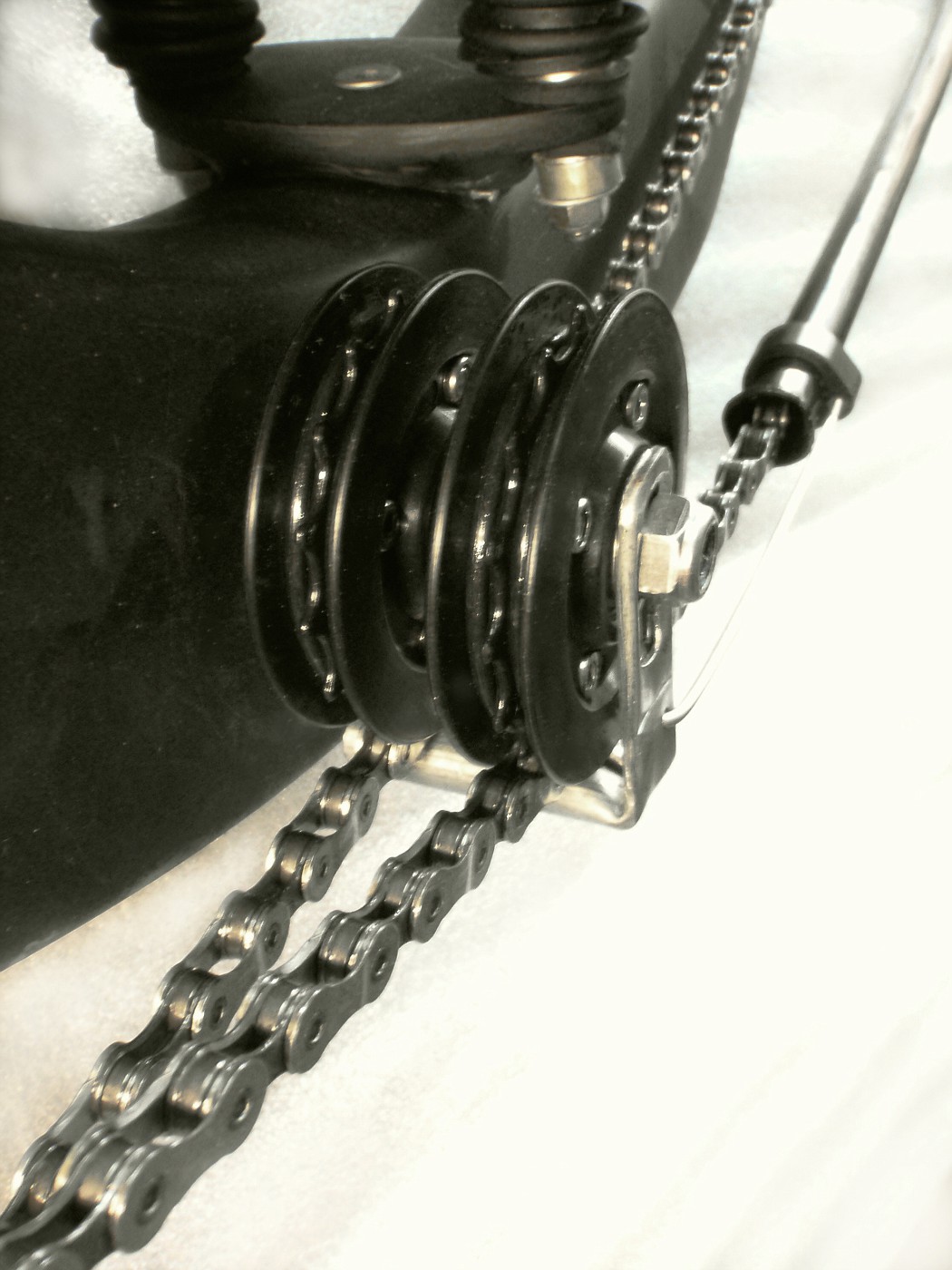 Assembled chain pulleys with bash guard