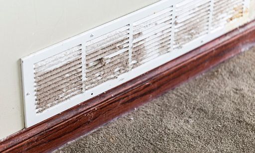 Dirty Air Filter- Removing of a dirty air filter from aircon